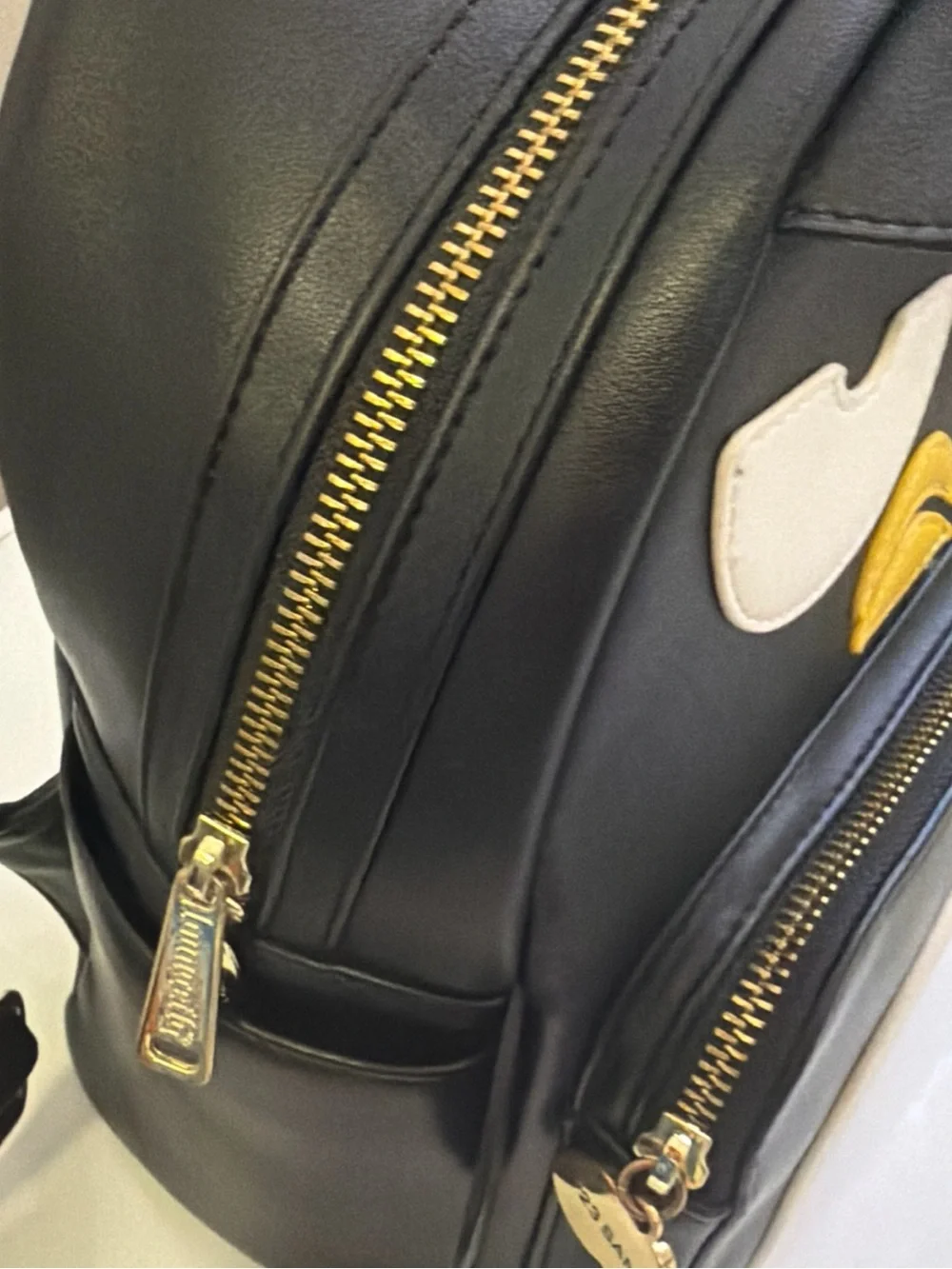 Loungefly hello kitty batzu maru Black White and Yellow Penguin Mini Backpack